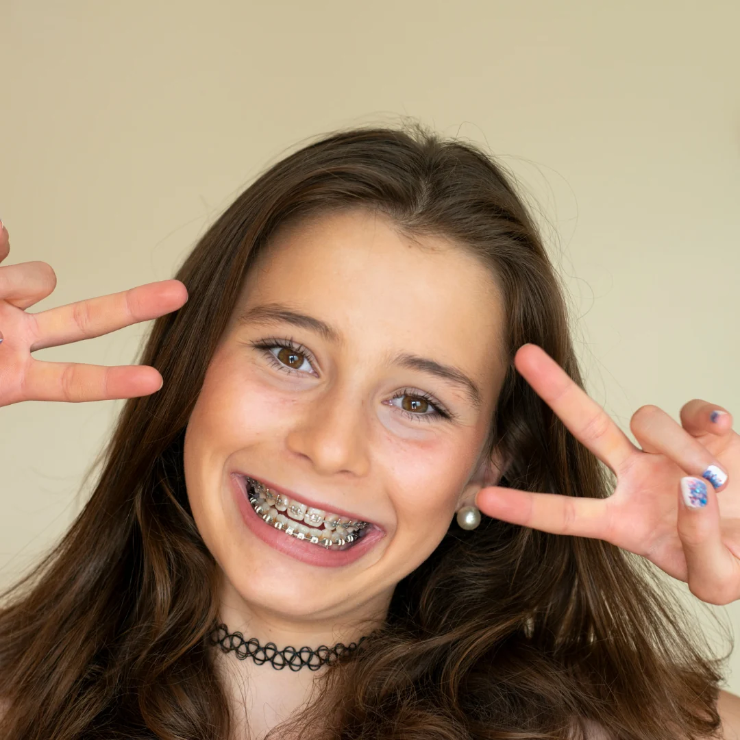Girl smiling with her braces